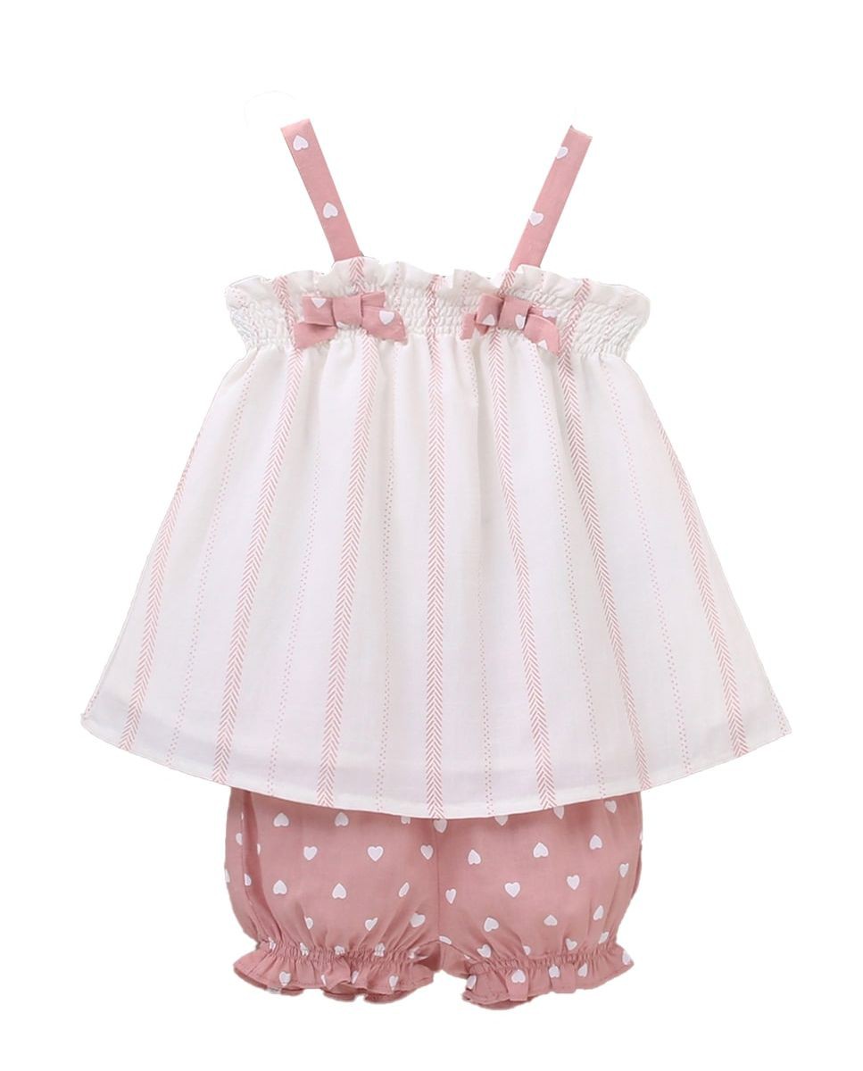 Vestido de bebé blanco con estampado en tonos rosas y combinado con rosa y corazones blancos 